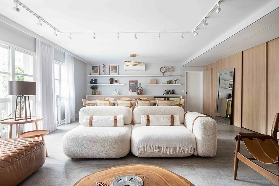 Apartamento de estilo urbano por C2h Arquitetos